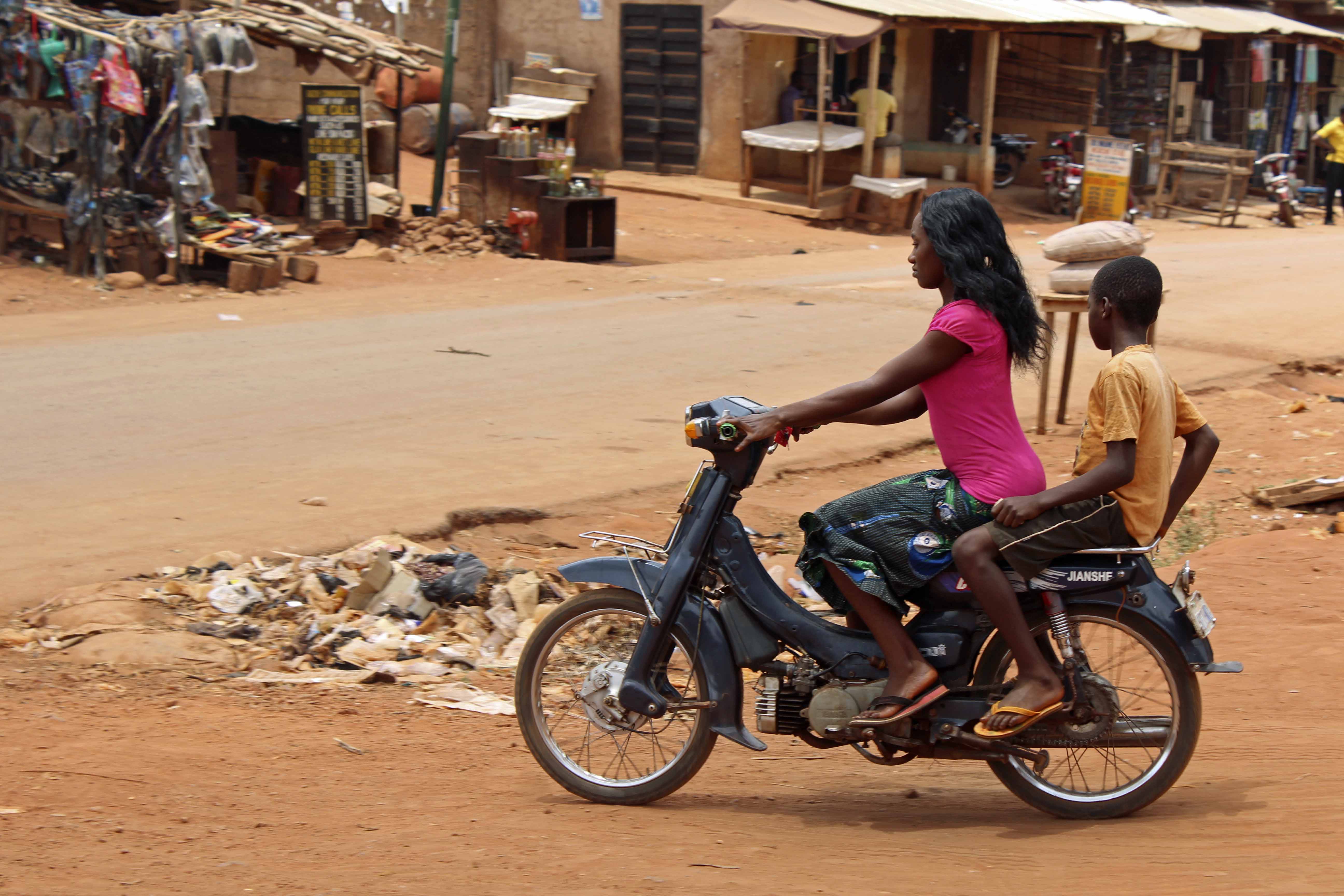 Iheaka Village Female Motorcyclist