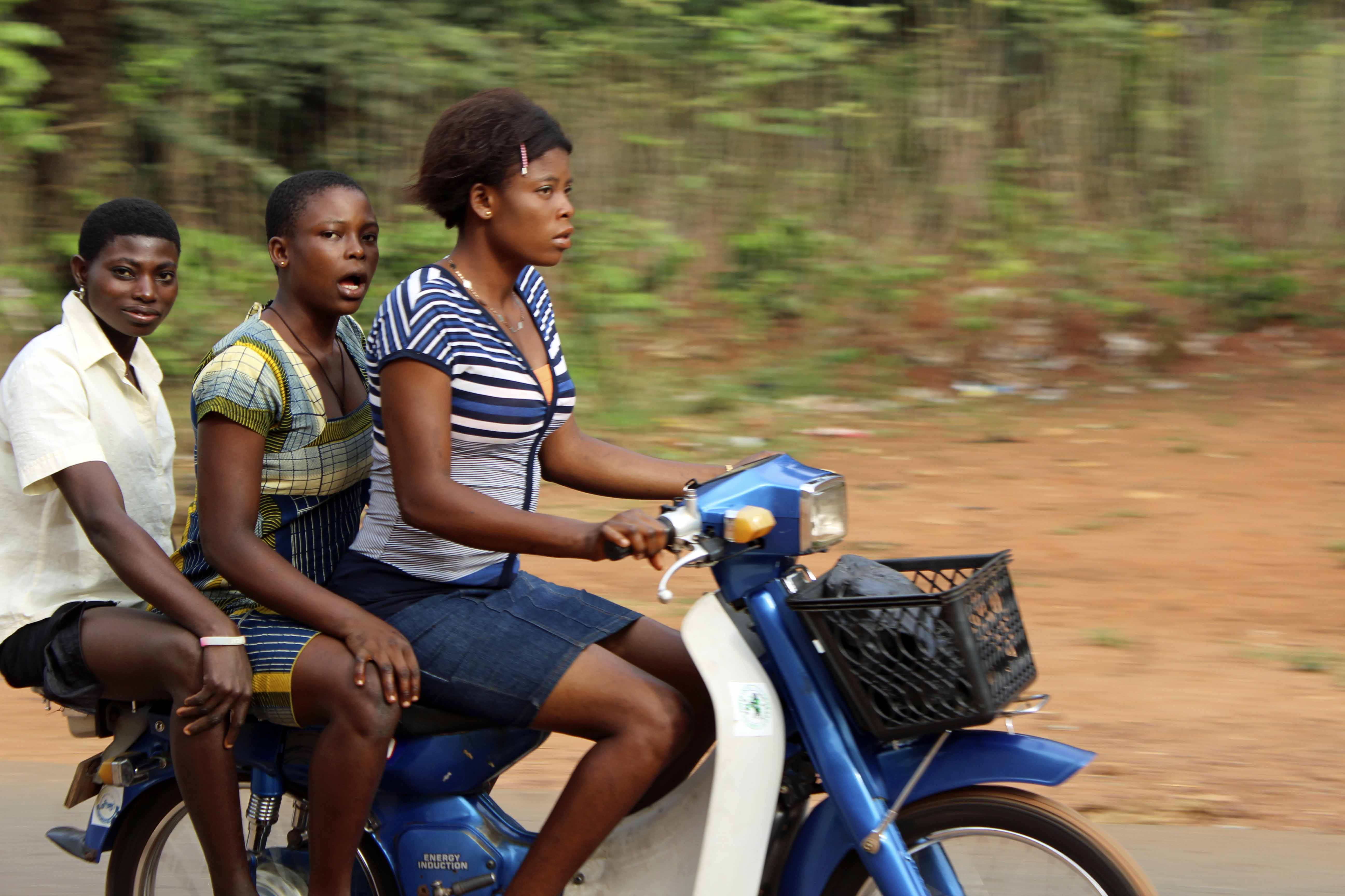 Igbo girls motorcycling in Obolo Village, Enugu State, Nigeria. #JujuFilms