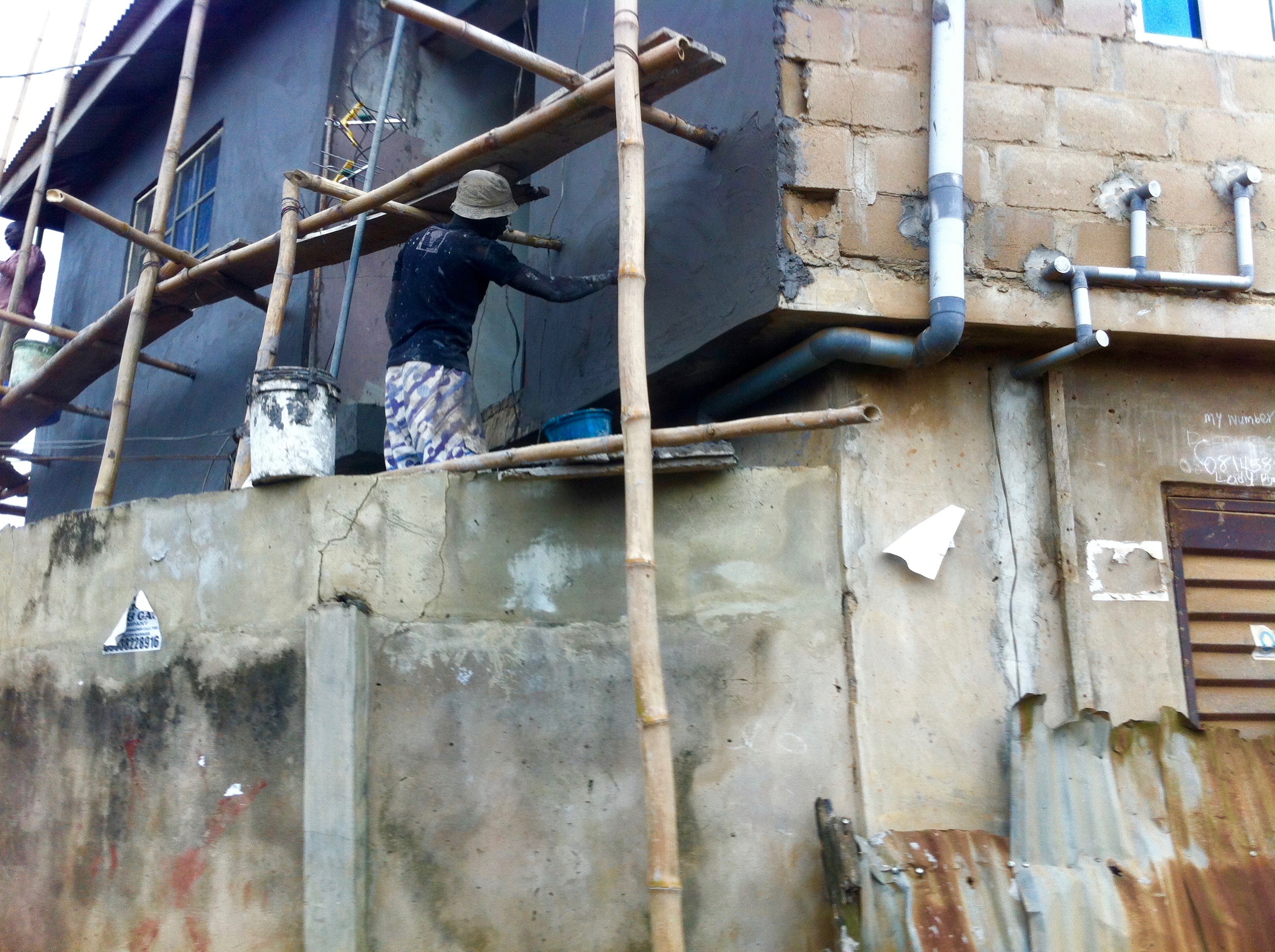 Plastering a house in Lagos, Nigeria.