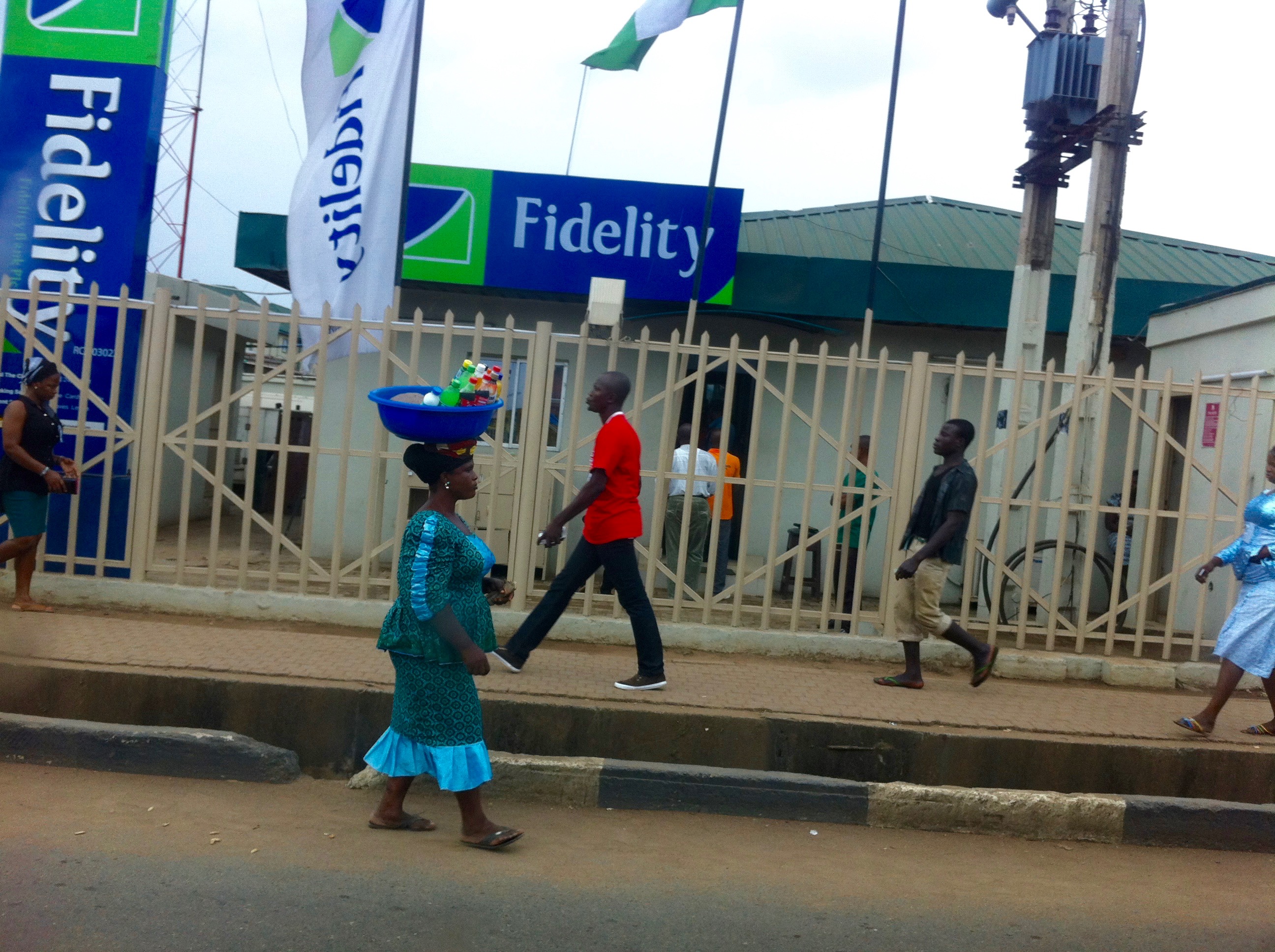 Street hawking soft drinks in Ikeja, Lagos, Nigeria. #JujuFilms