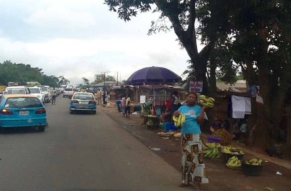 Woman roadside hawking bananas in Ilara, Ondo, Nigeria. #JujuFilms