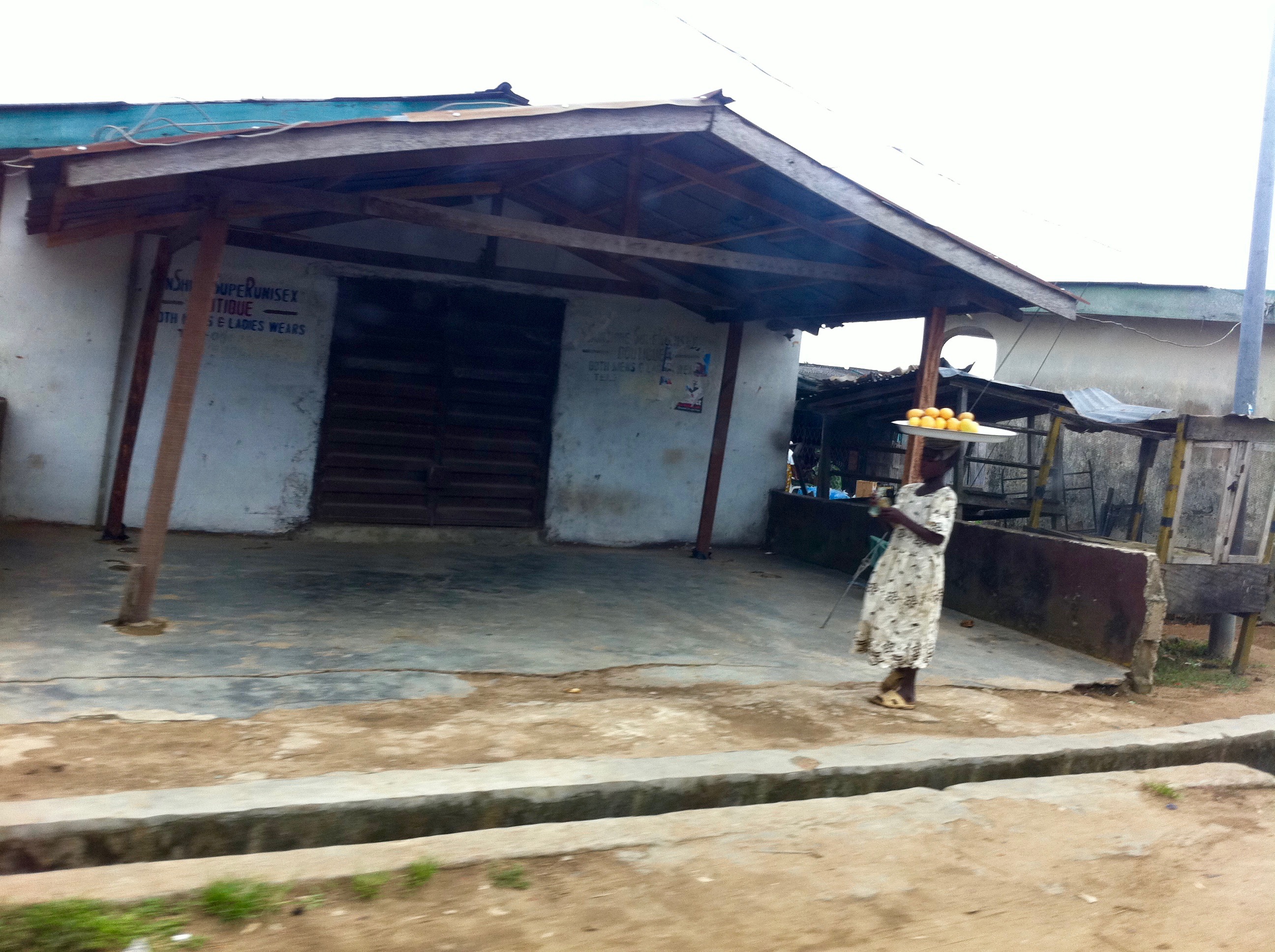 Young girl street hawking oranges in Epe, lagos, Nigeria. #JujuFilms