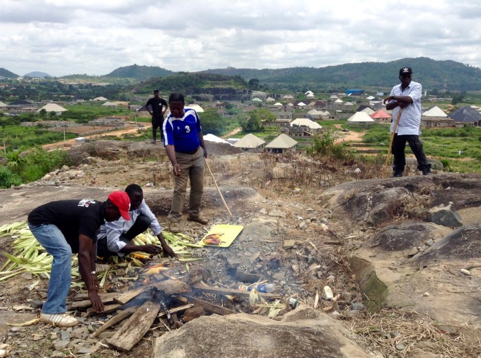 Roasting corn on open fire, Ushafa Village, FCT, Abuja, Nigeria. #JujuFilms