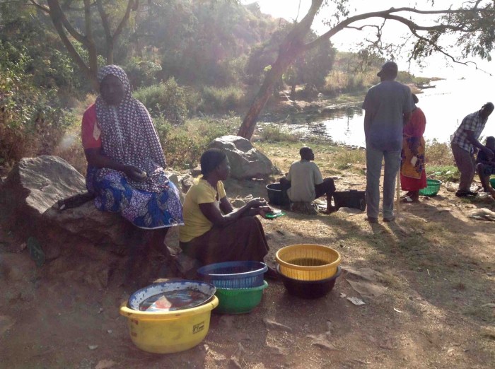 Selling fish from Usuma Dam in Ushafa Village, FCT, Abuja, Nigeria. #JujuFilms