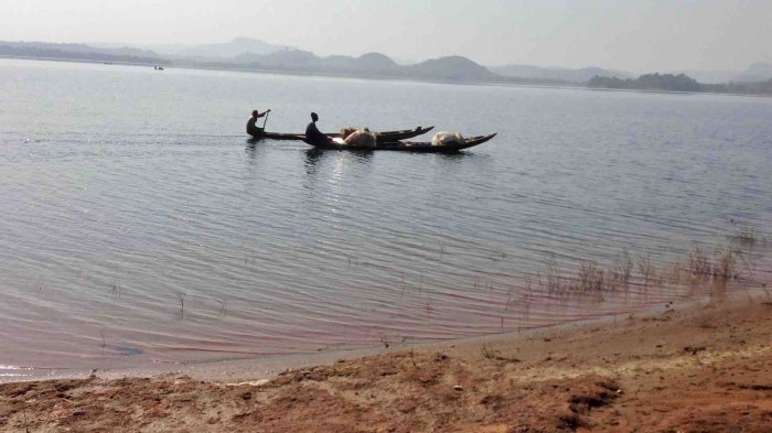 Fishermen canoeing on Usuma Lake, Ushafa, FCT, Abuja, Nigeria. #JujuFilms